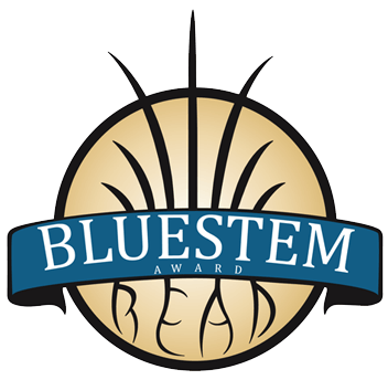 Bluestem award logo. The words "Bluestem Award" in white type on a blue banner in front of prairie grass with roots spelling the word "READ". 